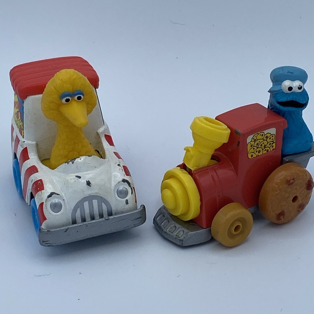 Sesame Street 1983 Big Bird Metal Popcorn Truck & Cookie Monster Train Playskool